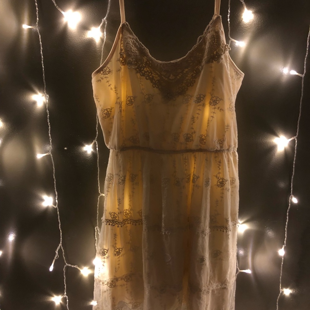 Créme colored dress